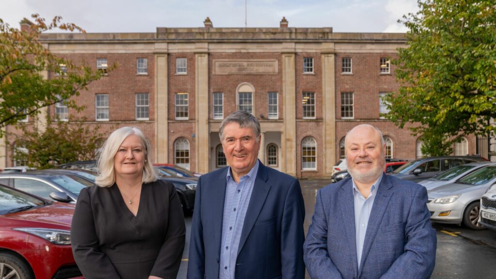 Mount Charles Chairman, Trevor Annon and COO, Jonathan Mallon with RBAI principle at the opening of Urban Square on campus