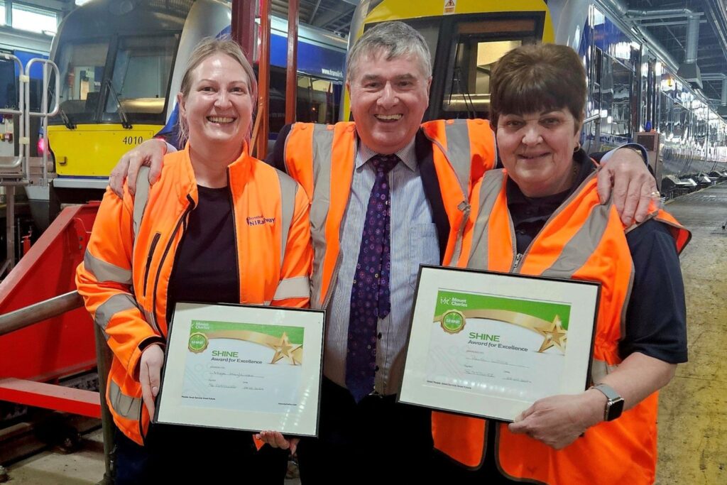 Mount Charles operative receiving their Shine awards