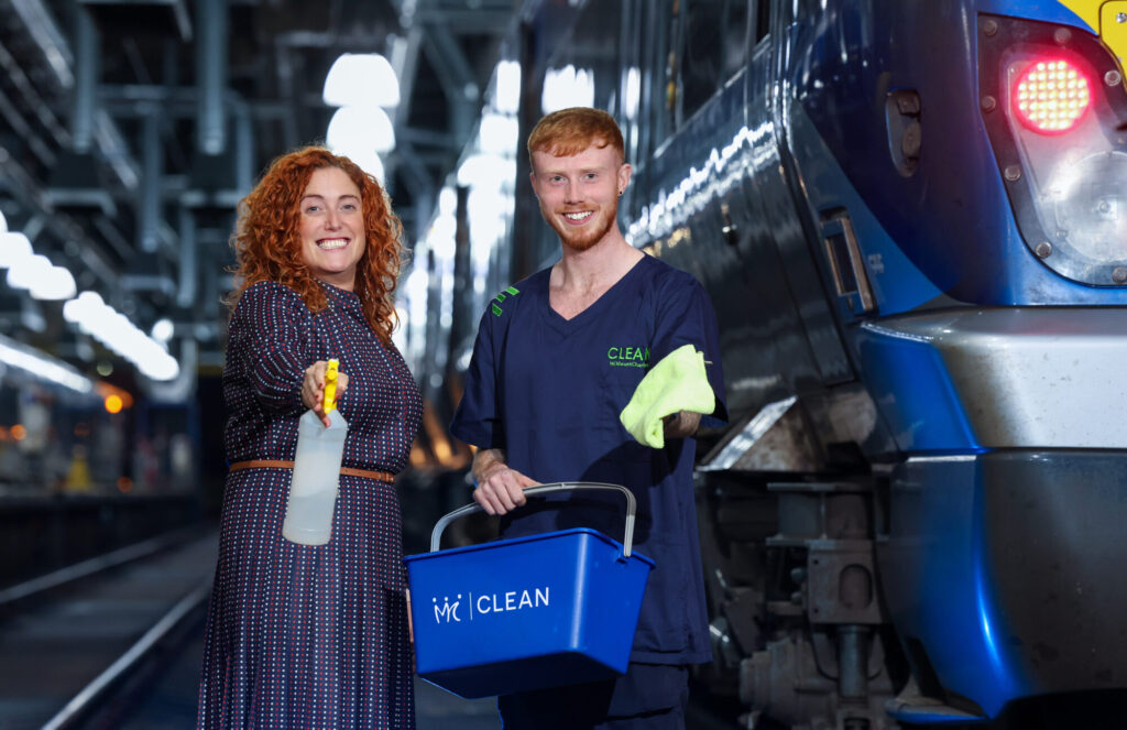 Translink trains cleaning team with train in the background