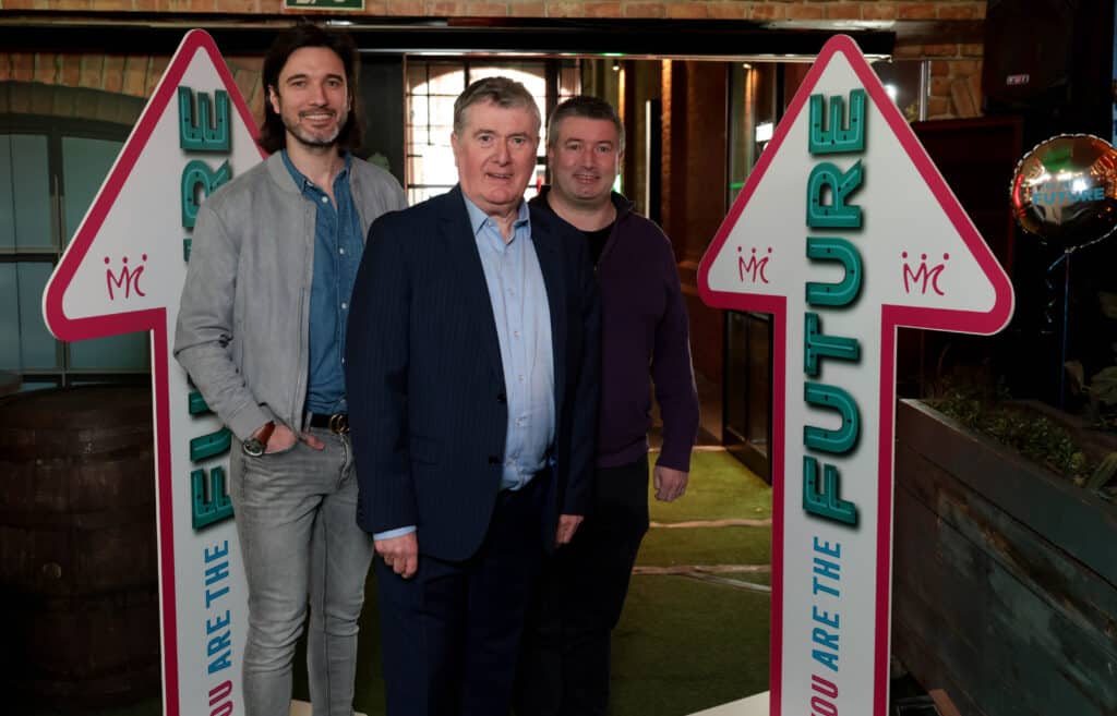 The Annon Family at strategy day launch 2025, with "you are the future" arrows on either side