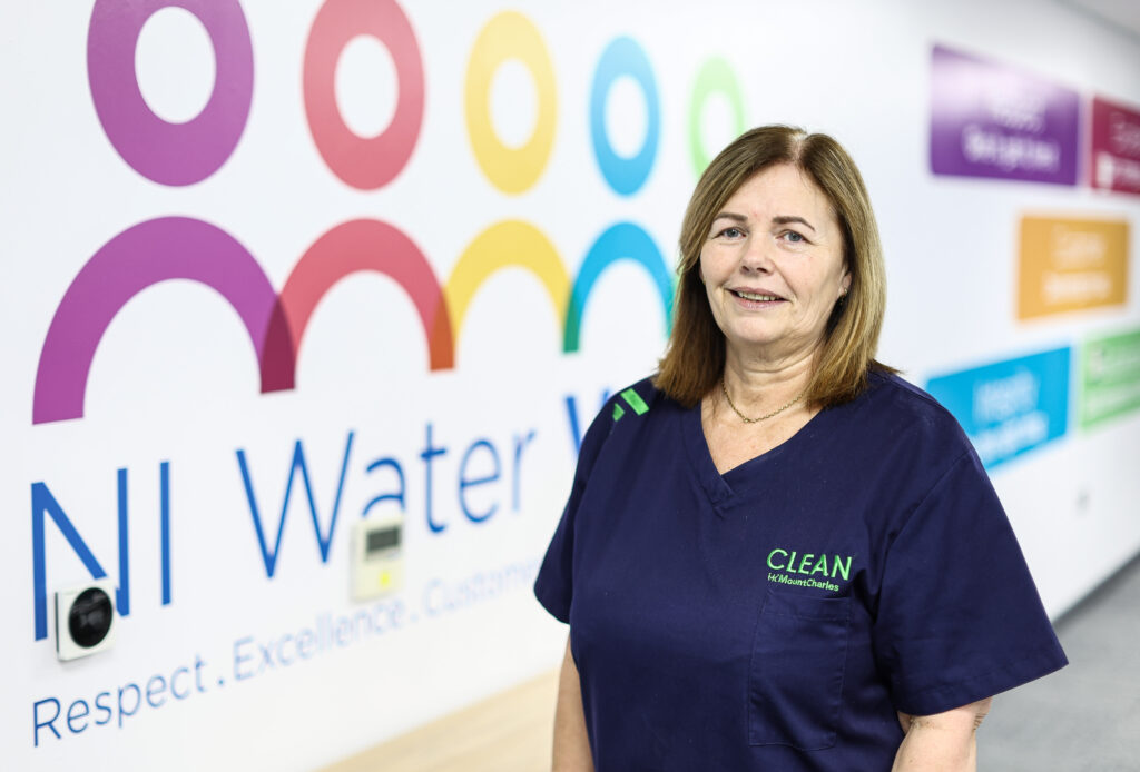 Cleaning Operative, Sharon Hill beside NI Water branding