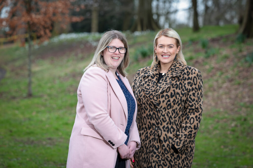 Louise Andrews and Suzi Bell in Ormeau Park, photo to accompany their International Women's Day 2025 interview